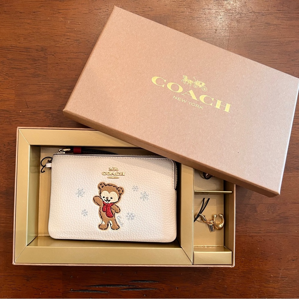 Brand New! Coach winter bear wristlet with gift box and 2 charms